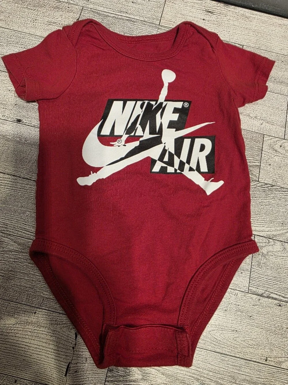 Jordan Red Short-Sleeve One-Piece Bodysuit with White Logo
